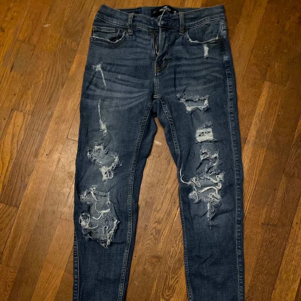Distressed dark wash jeans